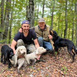 a group of people in a forest