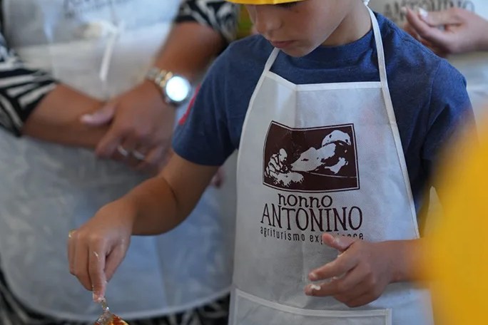 Hands preparing traditional Neapolitan pizza dough