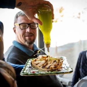 Italian bread with extra virgin olive oil tasting traditional food pairing