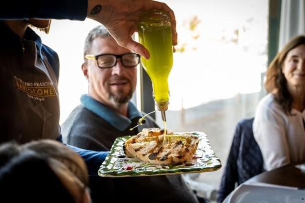 Italian bread with extra virgin olive oil tasting traditional food pairing