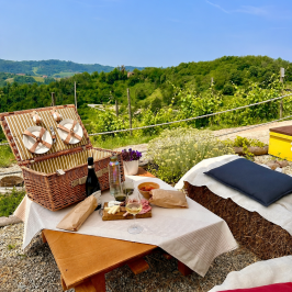 Sunset picnic setup in the hills of Monferrato, Italy
