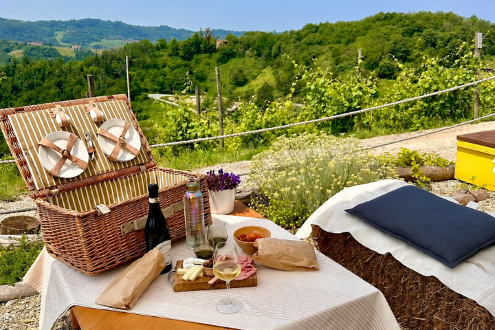 Sunset picnic setup in the hills of Monferrato, Italy